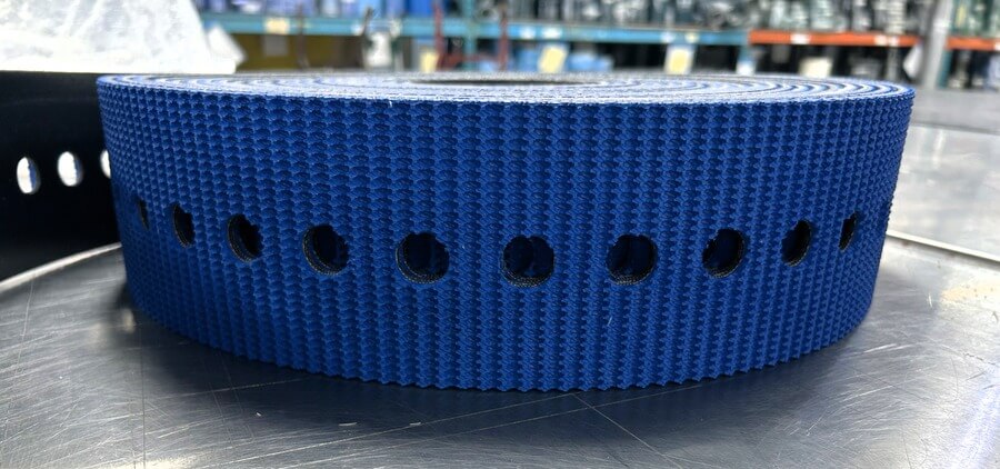 Perforated blue belt roll