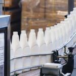 Conveyor belt with plastic bottles on it